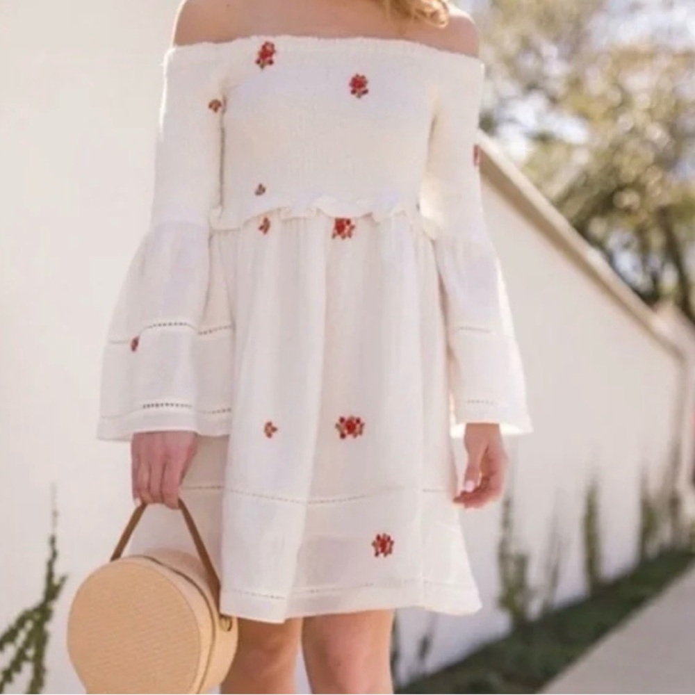 Elegant Off-Shoulder White Dress with Red Floral Accents